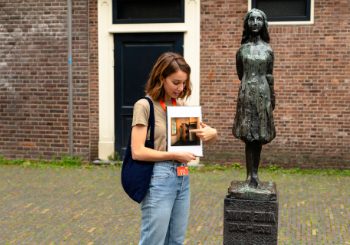 Anne Frank Statue Westerkerk Amsterdam with guide